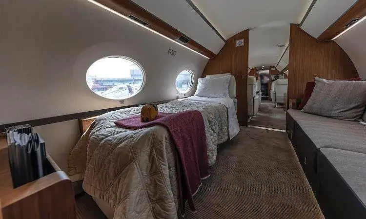 Gulfstream G650ER private sleeping area with luxury seating and panoramic windows